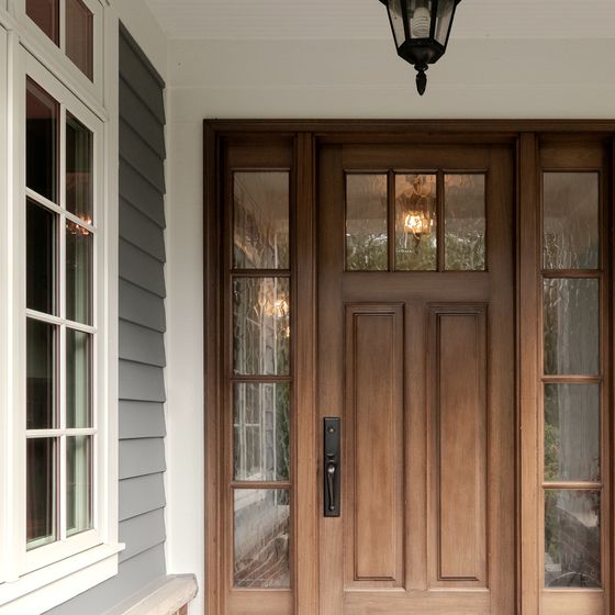 The front door and porch of a family home